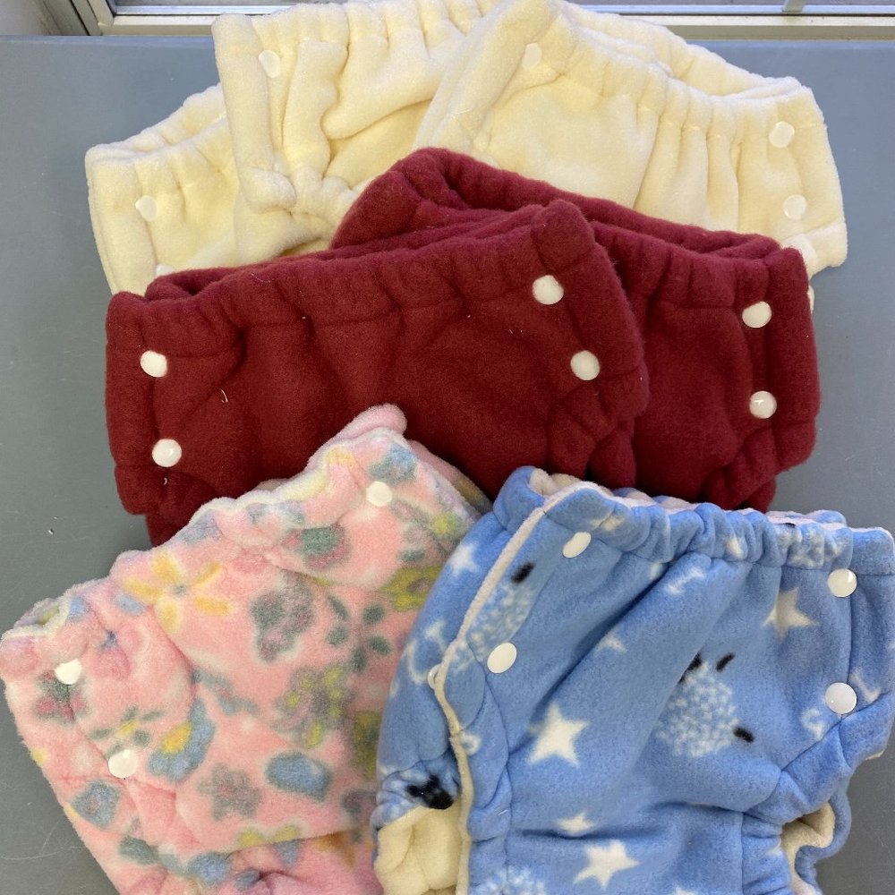 BRAND NEW Cloth Diaper Covers Size small (bundle of 7)
